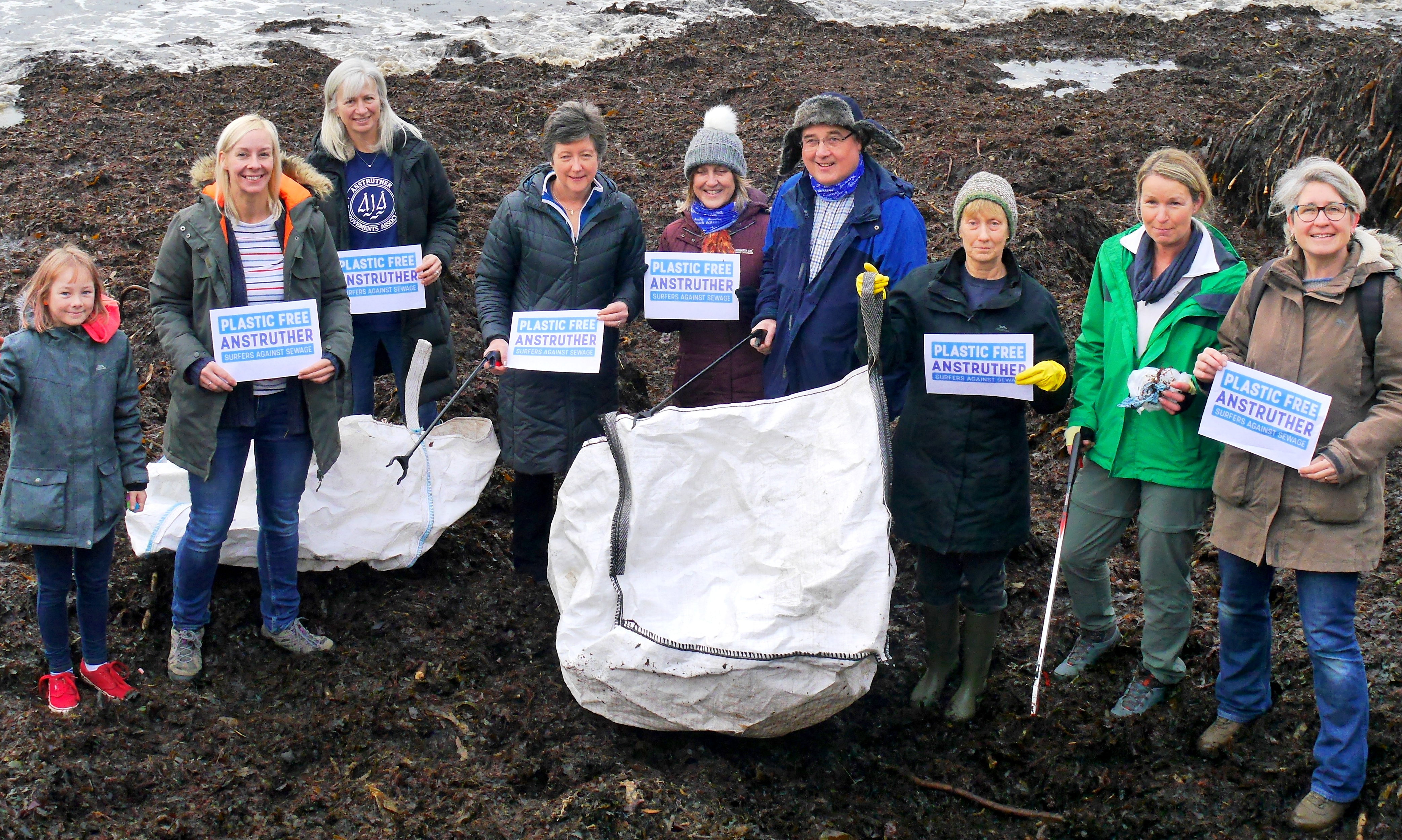 Plastic Free Anstruther members during a beach clean.