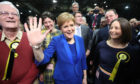 First Minister Nicola Sturgeon celebrates with supporters at the SEC Centre in Glasgow  during counting for the 2019 General Election.
