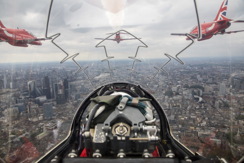 A Red Arrows flypast over London, taken from Red 10, piloted by Sqn Ldr Adam Collins with Cpl Ashley Keates, team photographer in the rear.