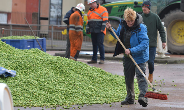 A lorry shed hundreds of thousands of Brussel sprouts in Fife crash.