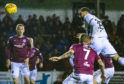 Kane Hemmings scores for Dundee at Gayfield.