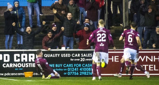 Bobby Linn, left, celebrates his wonder goal.