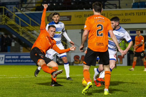 Lawrence Shankland scores at Cappielow.