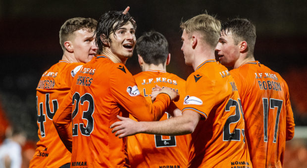 Ian Harkes (number 23) celebrates his goal with his teammates.