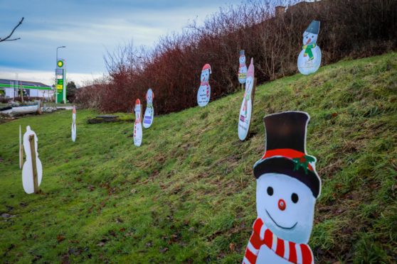 Thieves have stolen snowmen decorations and signage from the display.