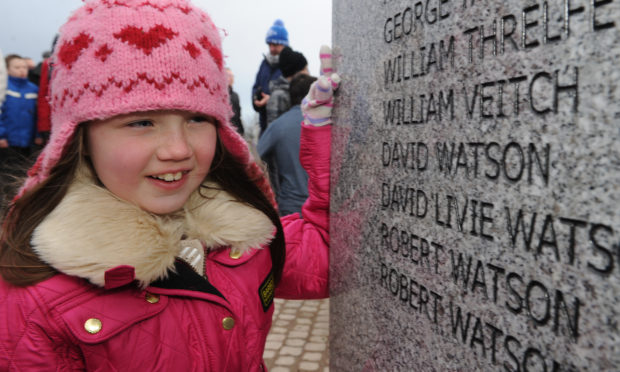 Pictured at the unveiling of the memorial to the victims of the Tay Rail Bridge Disaster on Riverside Drive, Dundee in 2013 - Gabrielle Thomson (8) reads the name of her great great great grandfather David Watson
