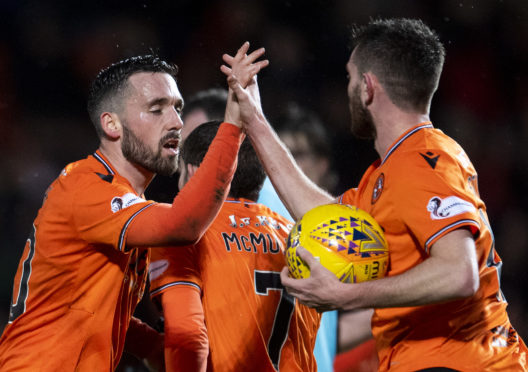 Nicky Clark celebrates his goal.