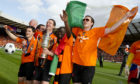 The Dundee United players  celebrate their cup final win.