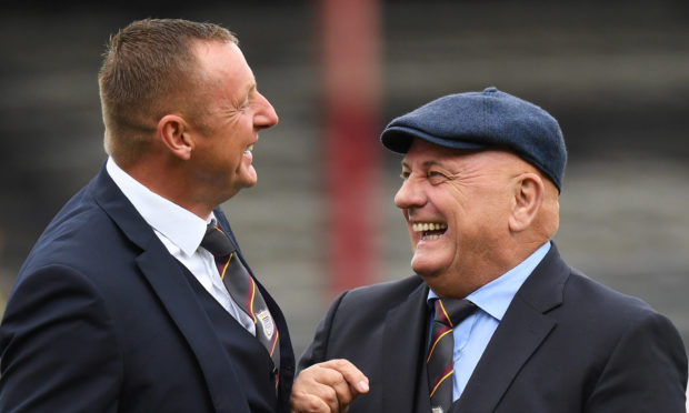 Rab Douglas and Dick Campbell at Dens Park earlier in the season.