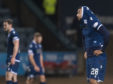 Dundee's Kane Hemmings looks dejected at full-time.