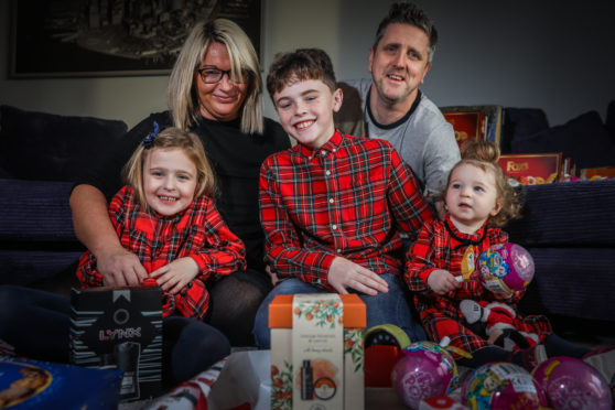 Carnoustie 10-year-old Harley Cathro Abbott Hughes with sisters Sophie, 4, Lily, 1,  and parents Katy and Kevin.