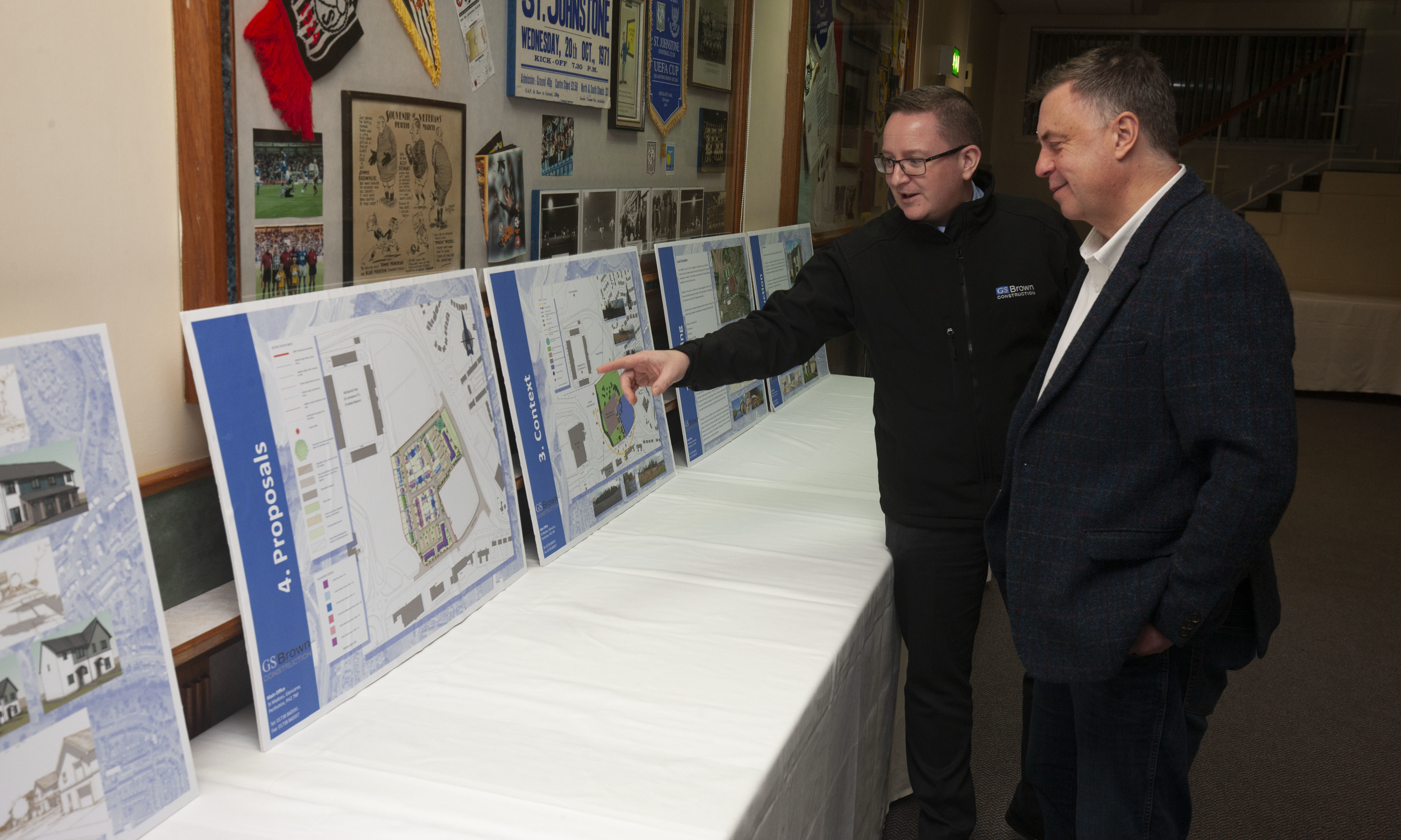 Kevin Spence, architectural manager at GS Brown and Cllr John Rebbeck inspect the plans.
