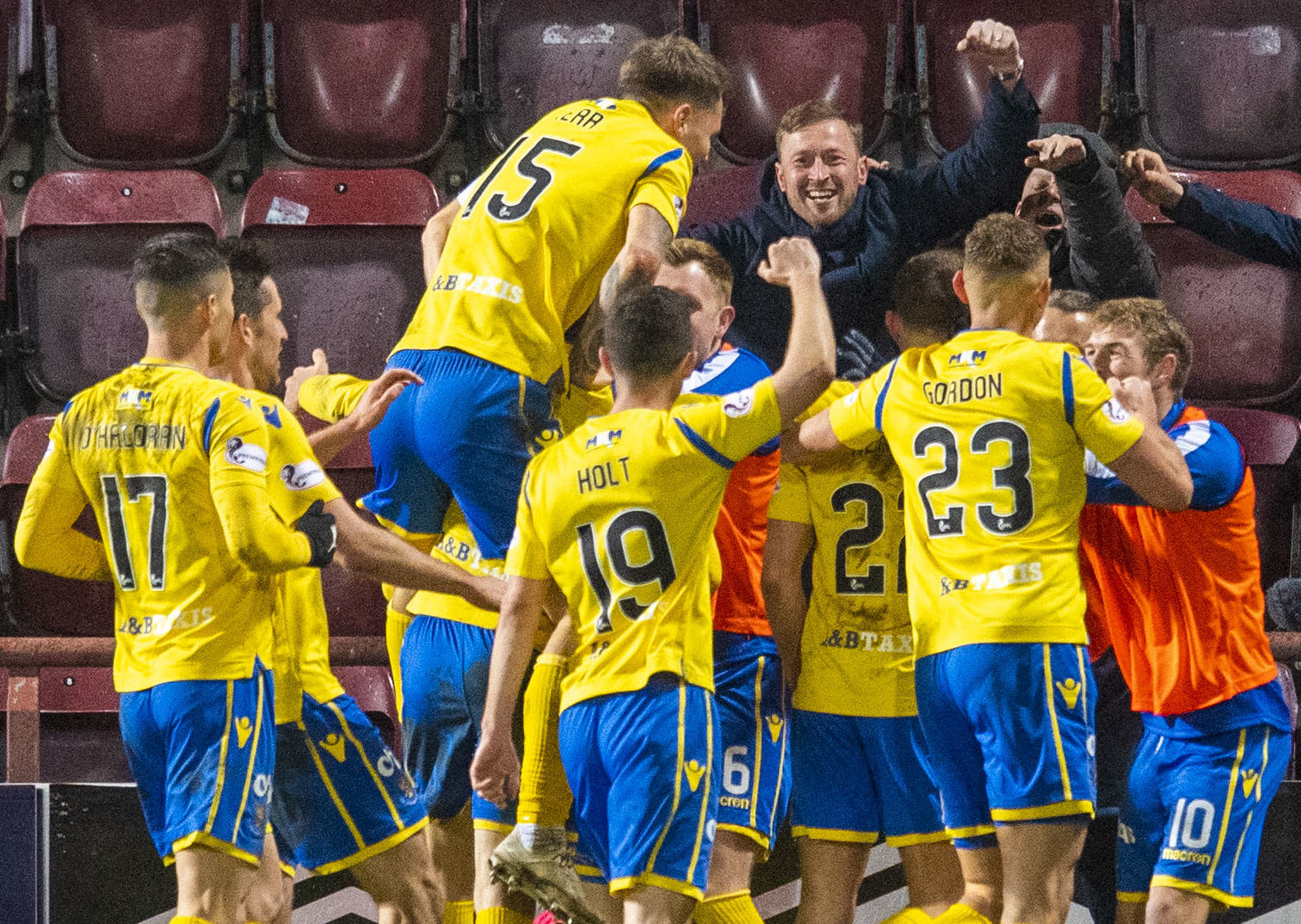 The St Johnstone players celebrate the winning goal against Hearts.