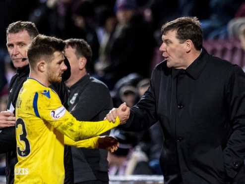 Tommy Wright shakes hands with Matty Kennedy on Saturday.
