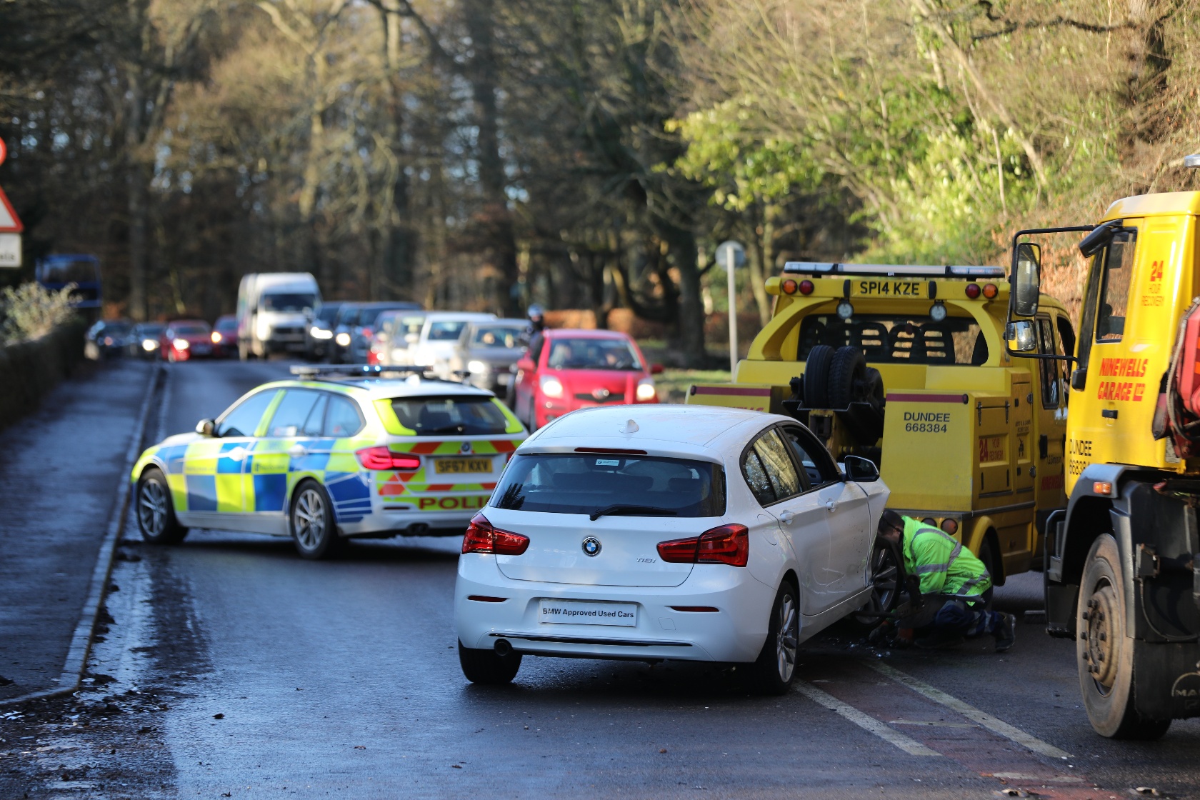 Drivers told to 'avoid' busy Dundee road as threevehicle crash forces closure