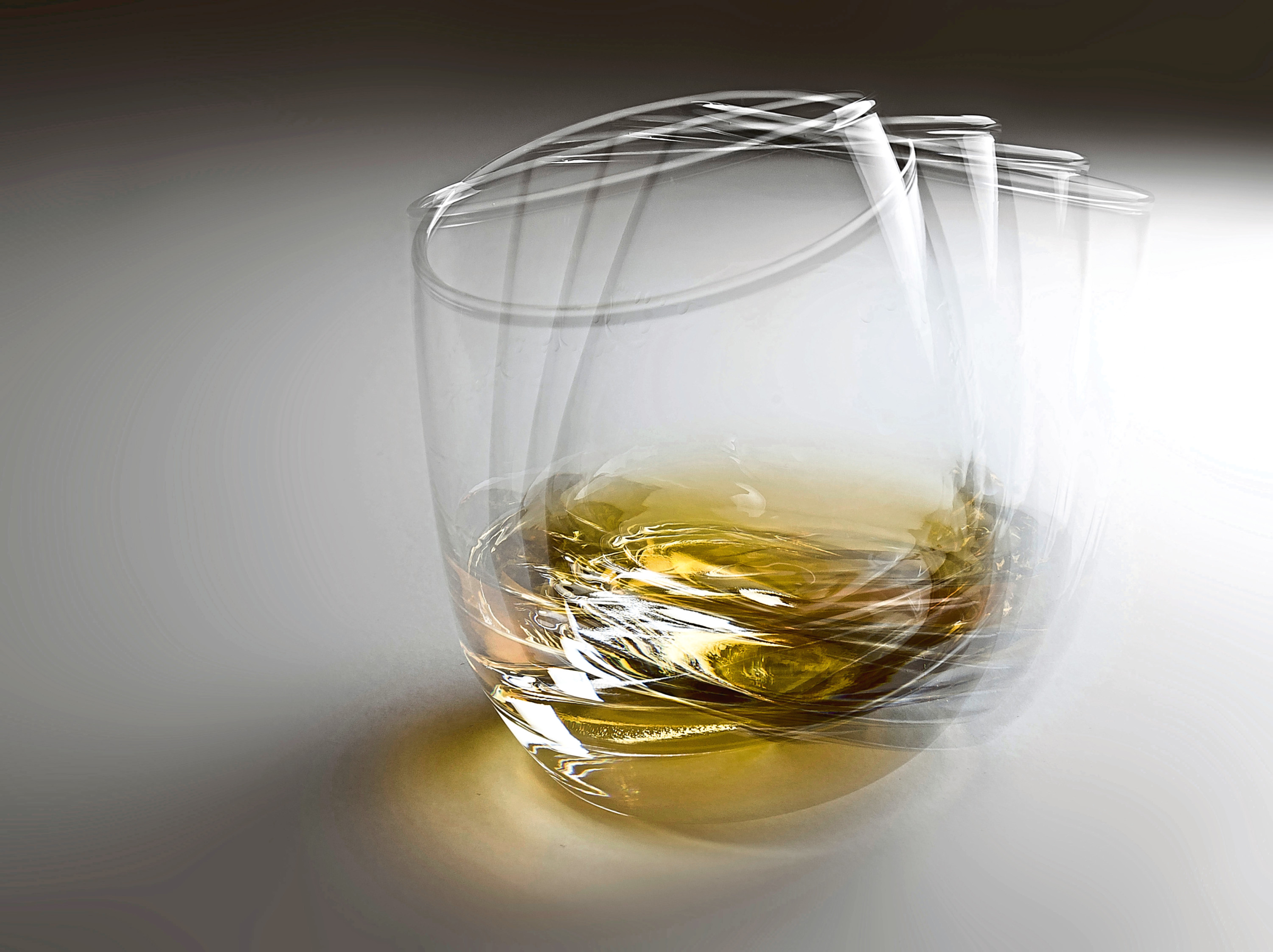 Whisky glass swirling; Shutterstock ID 1189914805; Purchase Order: -