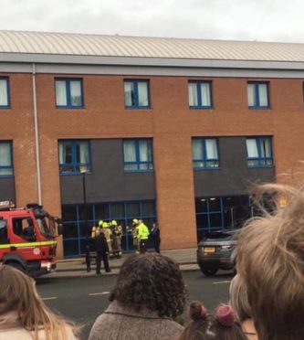 Firefighters at Bell Baxter High School.