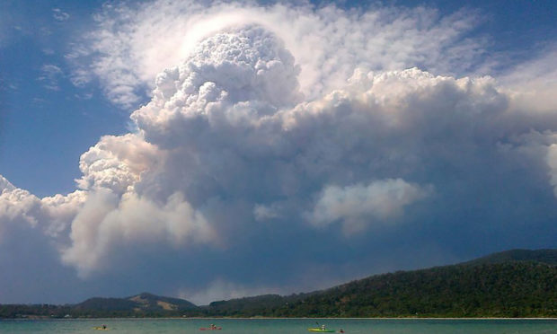 A fire-generated thunderstorm is formed near Nowra, New South Wales, Australia.