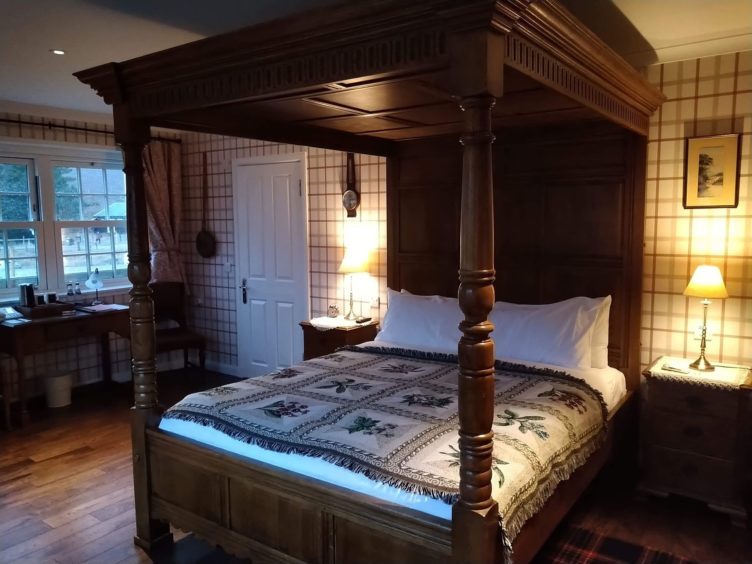 The Cluanie Inn bedroom had a four-poster bed.
