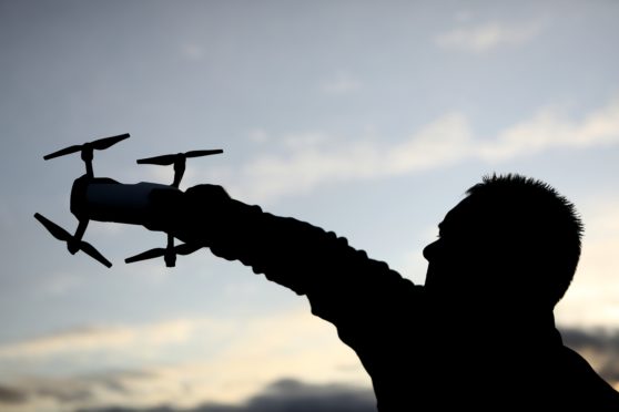 Councillor Stewart with a drone.