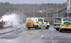 Police have closed off the beach promenade at Stonehaven.