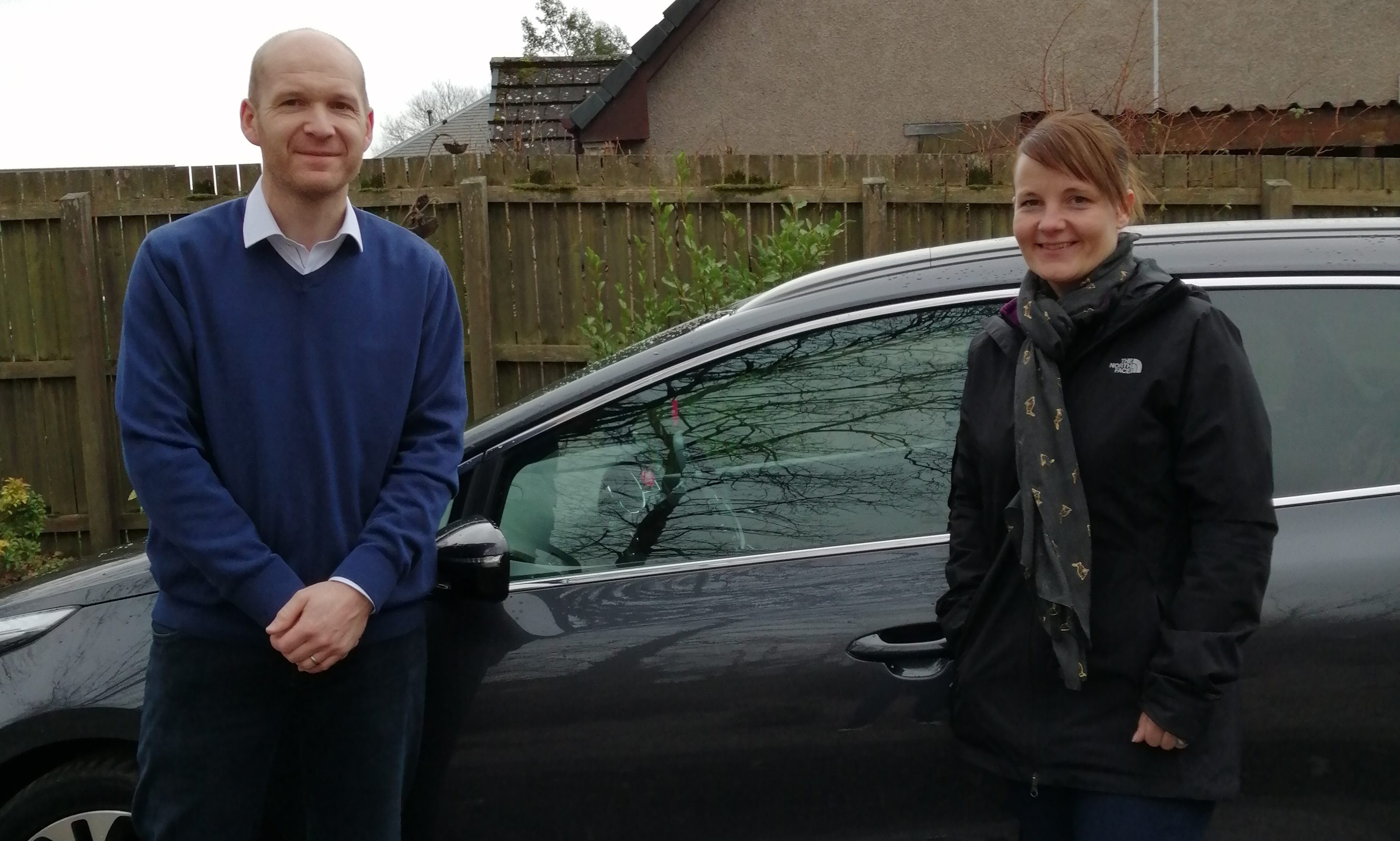 Nikki Murray collects the repaired vehicle from Perth College lecturer Duncan Reid.