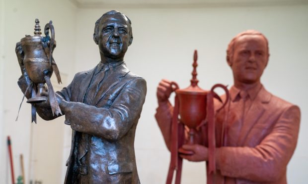 A completed maquette of the statue of Dundee Utd Legend Jim McLean stands in front of the statue which is ready now to be bronzed. Artist Alan Herriot has been commissioned to create the Statue which will take pride of place outside Tannadice once complete.