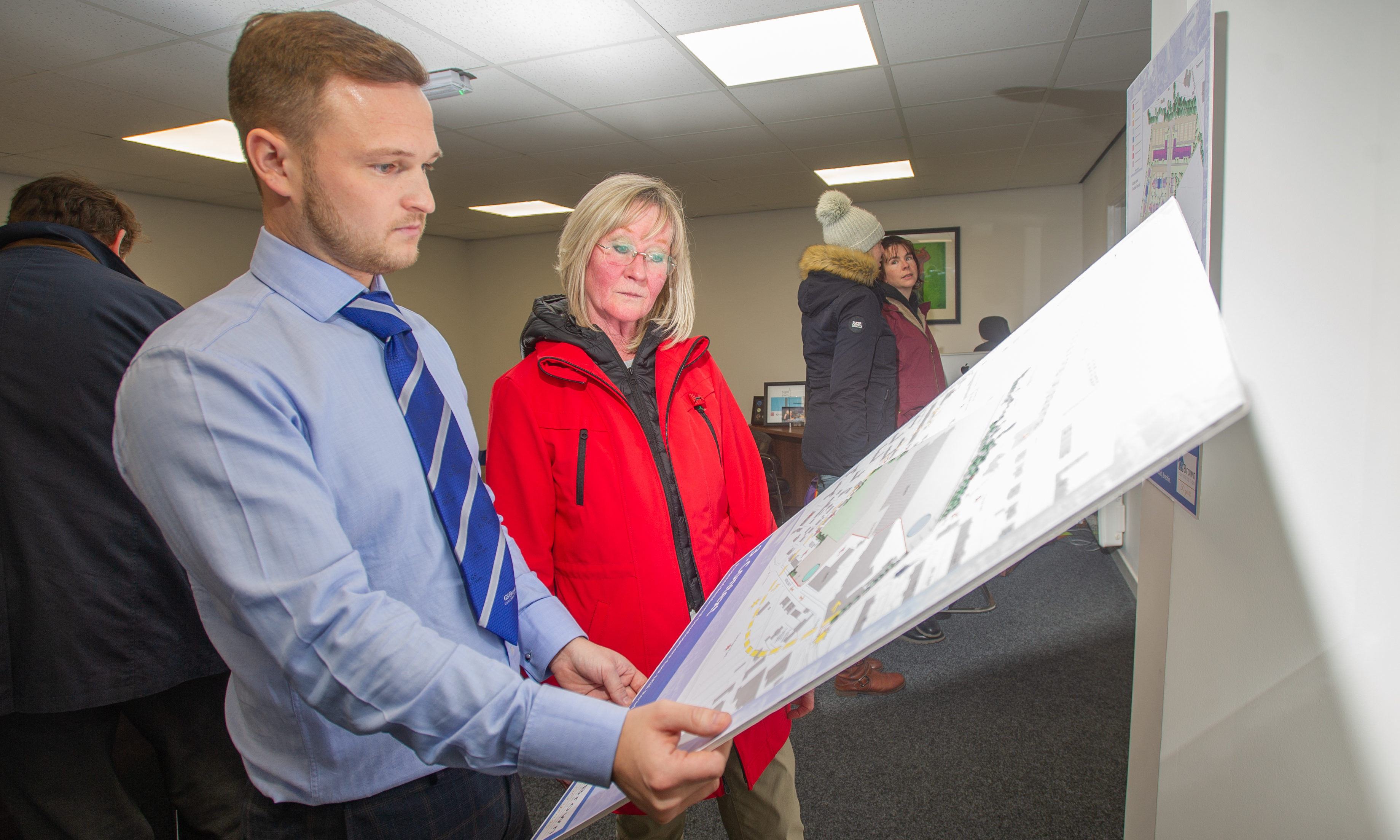 L to r - Ryan Brown (Land Manager GS Brown) and visitor to the event outling the proposals, Lorna Pattison, Mackie Motors, Clerk Street, Brechin, 15th January 2020, Kim Cessford / DCT Media.
