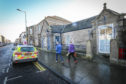The row over police funding deepened after the ceiling of Broughty Ferry police station collapsed