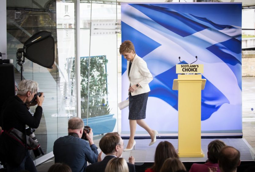 First Minister Nicola Sturgeon leaves the stage after speaking during an event at the Ozone, Our Dynamic Earth, in Edinburgh to outline Scottish independence plans on the day that the UK left the European Union.