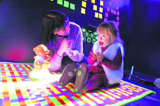 Elena pictured at home with mum Leona in Monifieth.