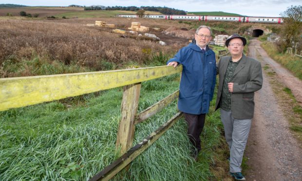 Councillors Tim Brett, left, and Jonny Tepp at the site of the development.