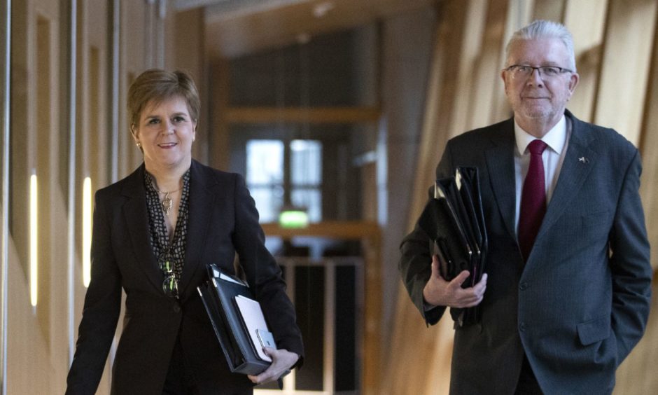 First Minister Nicola Sturgeon and Cabinet Secretary for Government Business and Constitutional Relations Mike Russell