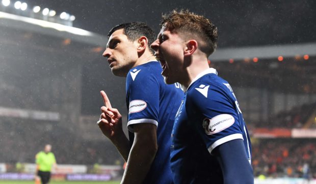 Graham Dorrans and Fin Robertson celebrate the equaliser against United.