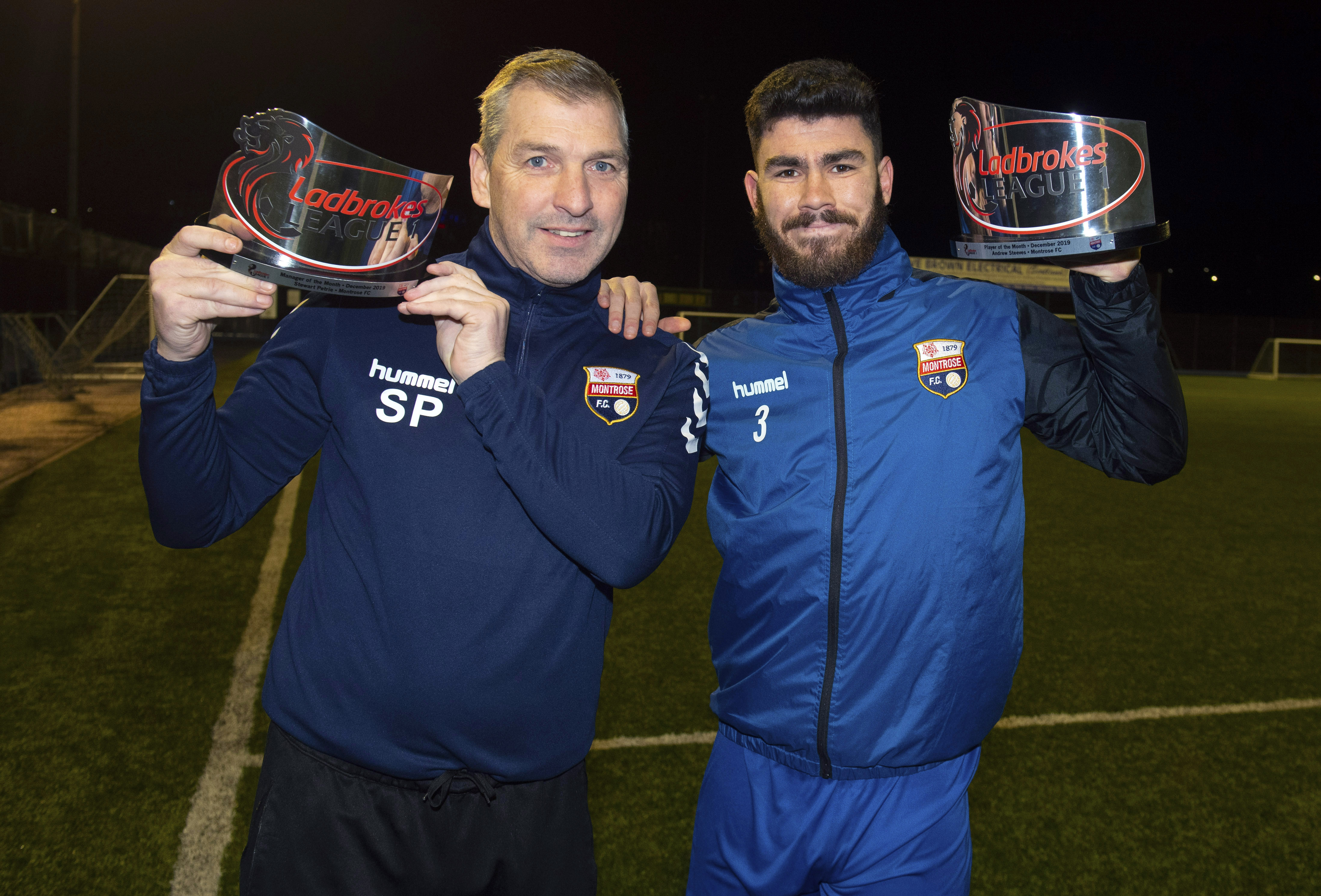 Stewart Petrie and Andrew Steeves with their recent manager and player of the month awards.