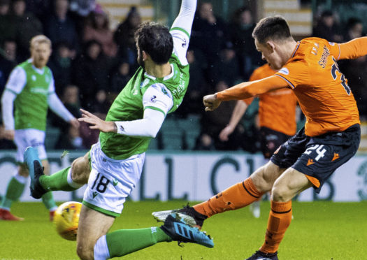 Lawrence Shankland fires United 1-0 up.