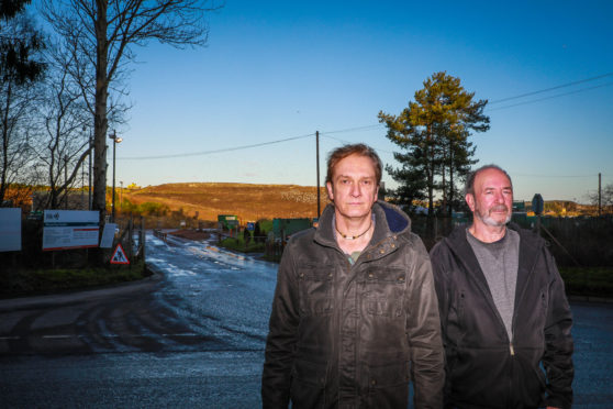 Graham Buchanan and John Sanders at Melville Landfill Site where the stink has blighted the community for a decade after it was due to be completed