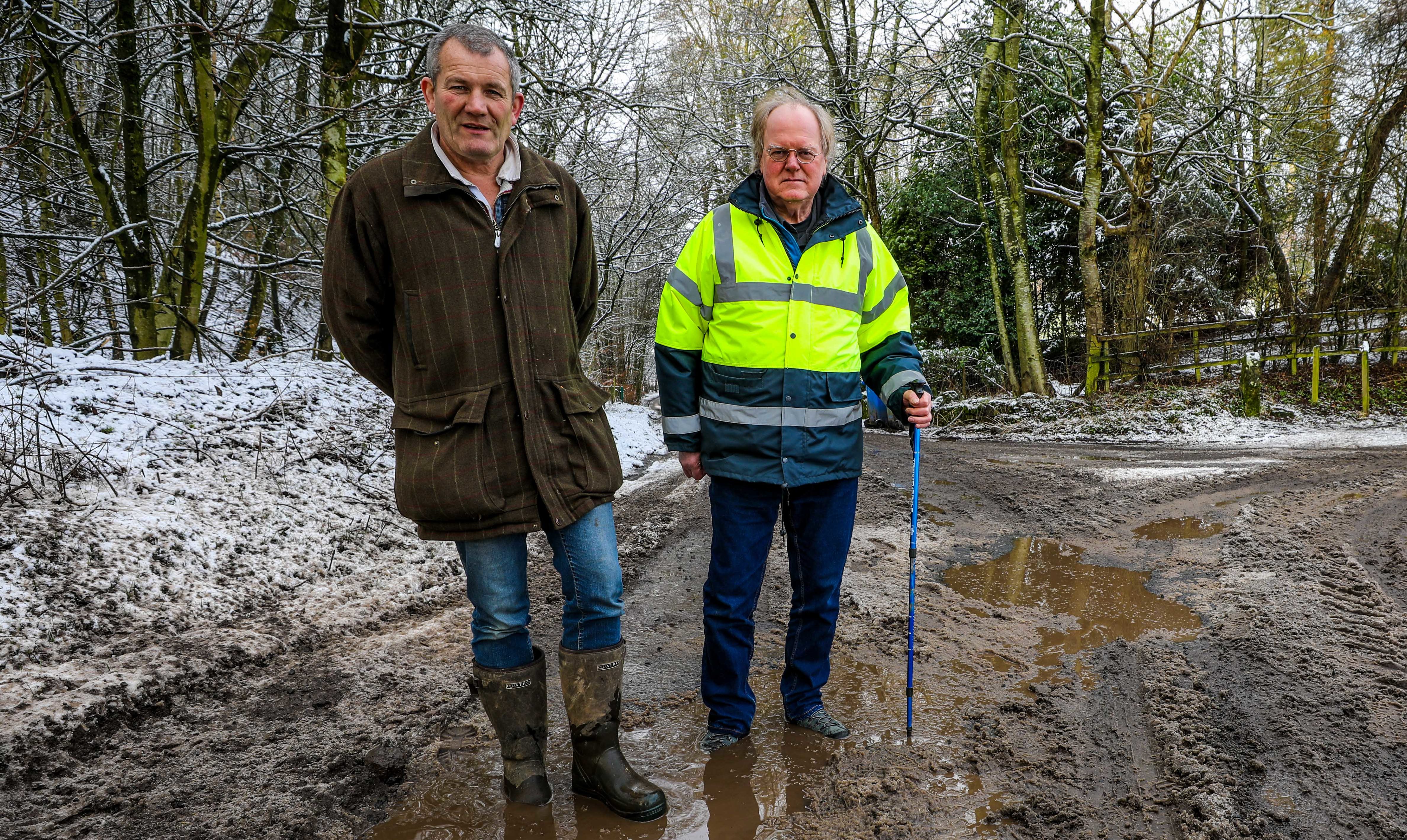 Farmer Murdo Fraser (left) and Councillor Andy Heer are worried about the condition of the potholed Q52 road near Auchtermuchty.