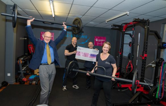 Scotland All-Strong fitness studio is celebrating a Lottery windfall for its Fitness to Feel Better Programme. 
Deputy First Minister John Swinney MSP was on hand along with Neil Ritch Scotland Director National Lottery Community fund to hand over the cheque to Owner Andy Douglas and his wife Jessica.