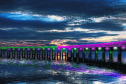 An impression of how the Tay Rail Bridge might look when lit up at night