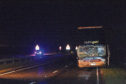 The damaged bus following the crash.