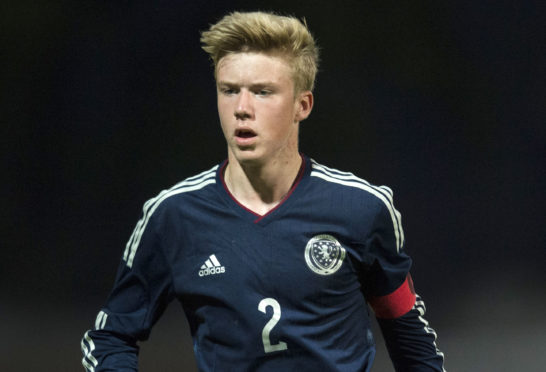 Kieran Freeman in action for Scotland.