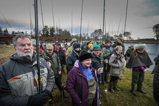 Anglers eagerly gather at Meikleour.