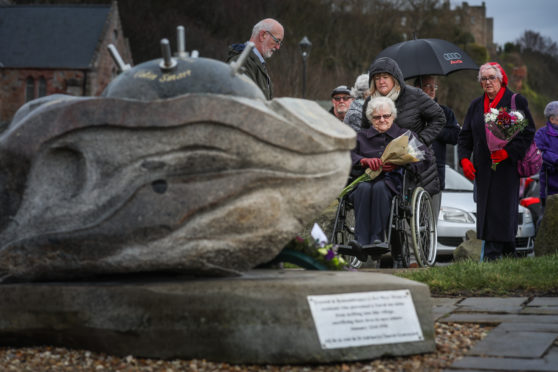 Community members gather for the commemoration