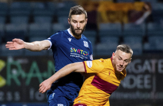 Jamie Ness in action against Motherwell.