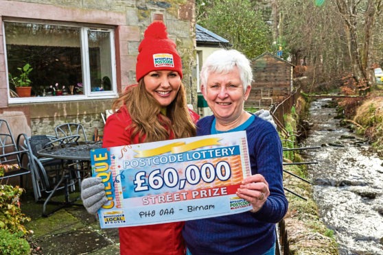 Dunkeld resident Evelyn Menzies and People's Postcode Lottery ambassador Judie McCourt.