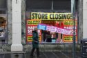 Store closing signs at Beales in Perth