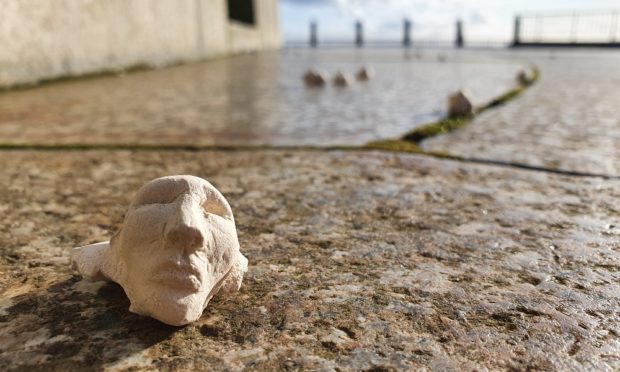 The faces at Dundee Law.