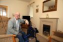 Jim Baker, 70, in the living room of his Carnoustie home.