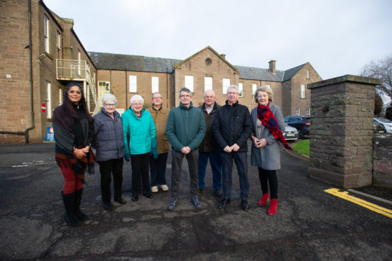 From left, Nilima Puthu, Moira Robertson, Irene Gillies MBE, Dick Robertson, Grahame Lockhart, John McKenna, Gary Robertson and Frances Keats.